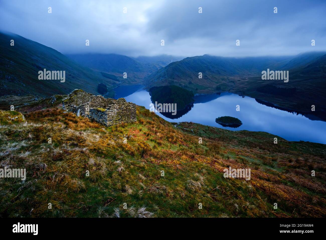 An abandoned building above Haweswater Reservoir in the Lake District Stock Photo