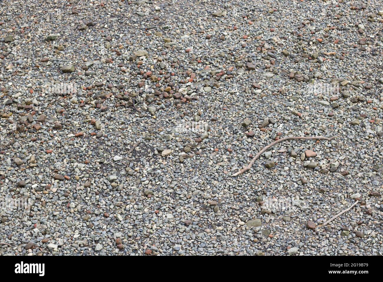 Full frame background showing small stones of assorted shapes and colours Stock Photo
