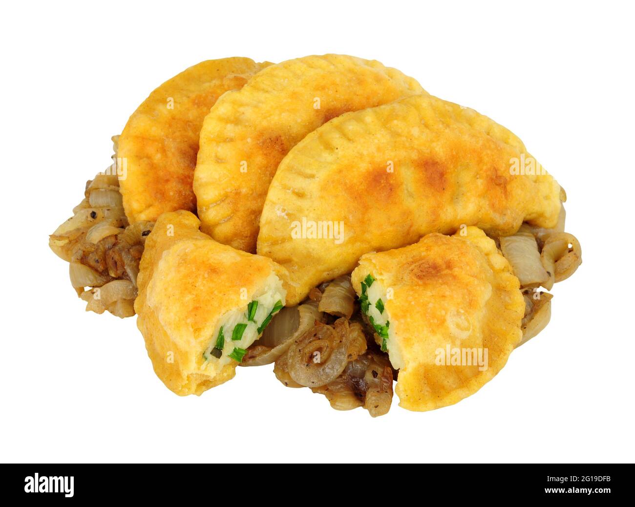 Group of potato and cheese filled Pierogi dumplings with fried onions isolated on a white background Stock Photo