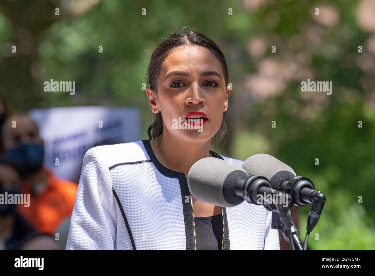 United States Congresswoman Alexandria Ocasio-Cortez speaks at a rally outside City Hall in New York City. Representative Alexandria Ocasio-Cortez endorses Juumane Williams for Public Advocate, Brad Lander for Comptroller as well as 60 progressive New York City Council candidates, stretching across all five boroughs, who took the Courage To Change pledge. Stock Photo