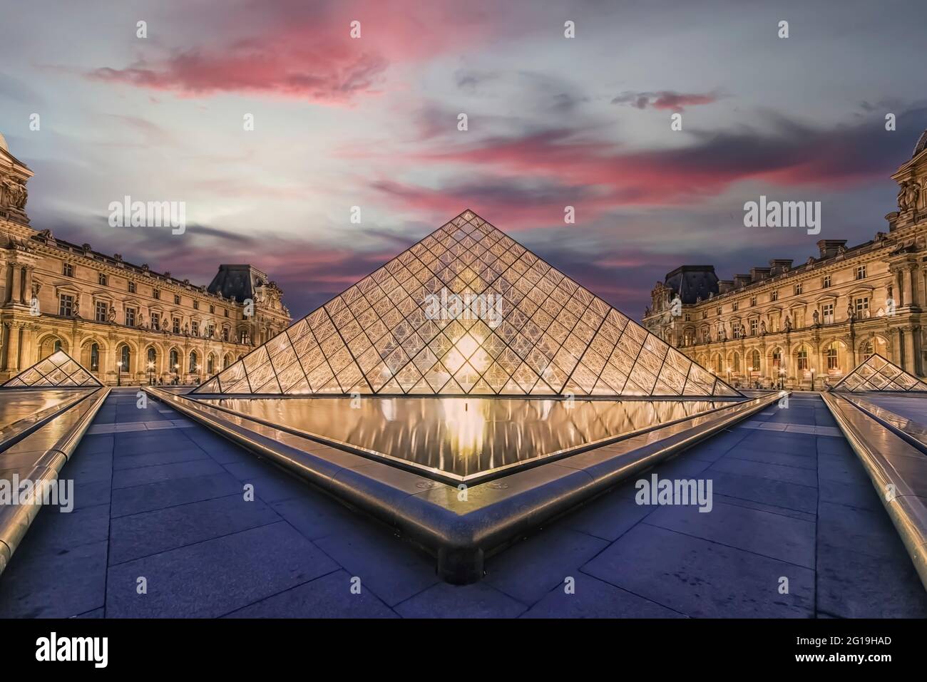 Louvre museum in the evening Stock Photo