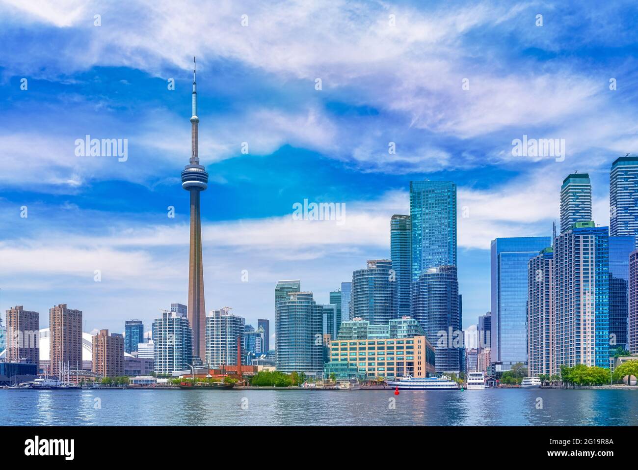 The Toronto city skyline during the daytime and seen from the Lake Ontario, Canada.†The image includes the CN Tower which is a symbol of the country Stock Photo