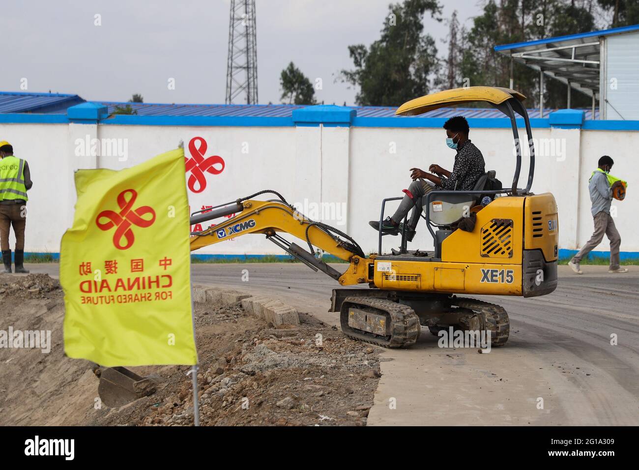 (210606) -- ADDIS ABABA, June 6, 2021 (Xinhua) -- Workers work on the construction site of the China-aided future headquarters of the Africa Centers for Disease Control and Prevention (Africa CDC) in Addis Ababa, Ethiopia, June 2, 2021. Construction work on the China-aided future headquarters of the Africa CDC is running 'very smoothly with full force,' a long-serving African Union expert has said.  TO GO WITH 'Interview: China-aided Africa CDC project running smoothly with 'full force,' says expert' (Xinhua/Michael Tewelde) Stock Photo