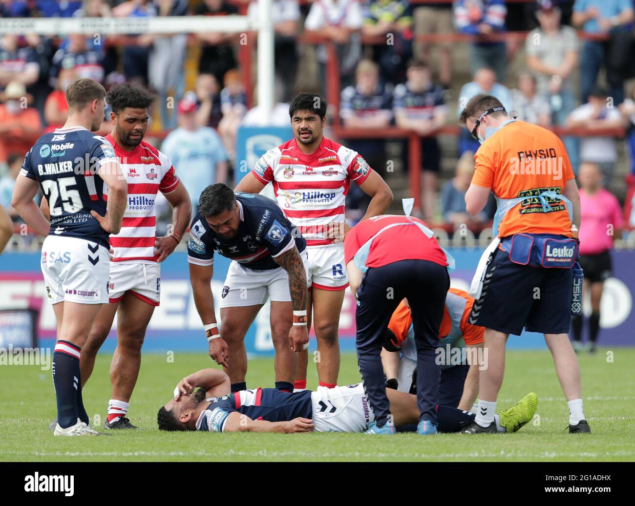 Wakefield Trinity's Kelepi Tanginoa receives treatment for an injury during the Betfred Super League match at the Mobile Rocket Stadium, Wakefield. Picture date: Sunday June 6, 2021. Stock Photo