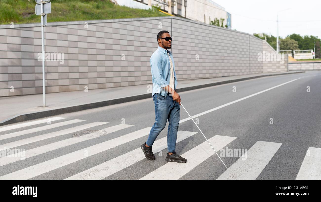 Visually impaired person walking hires stock photography and images