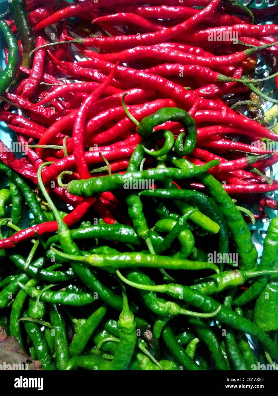 Red and green chili peppers Stock Photo - Alamy