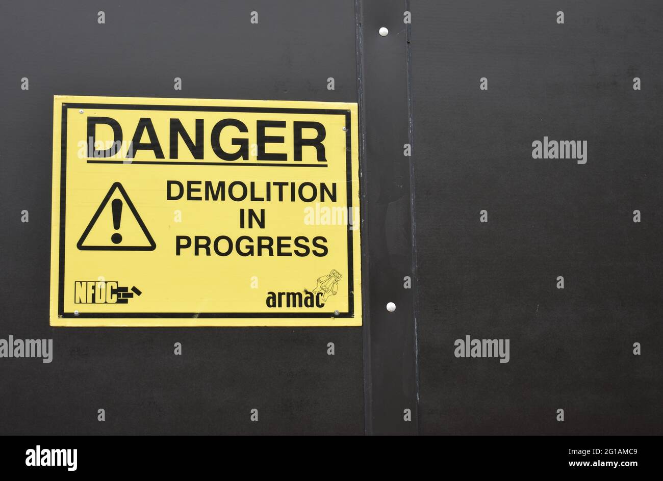 Warning sign: Danger Demolition in Progress Stock Photo