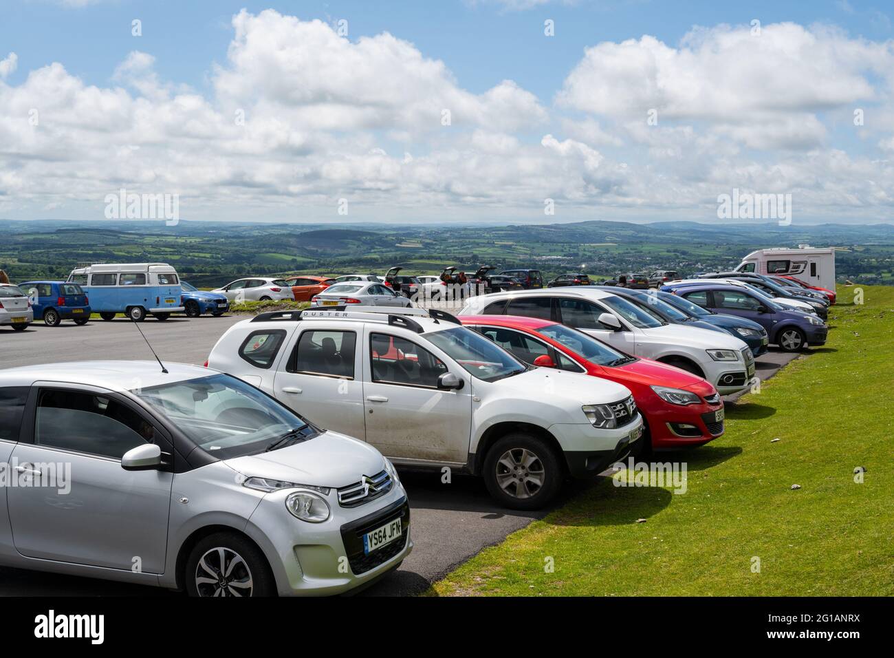 Staple Tor, Dartmoor National Park, Devon, UK. 6th June, 2021. UK Weather: The car parks in Dartmoor National Park were busy as people headed out to enjoy the warm and sunny weather on Sunday afternoon. Credit: Celia McMahon/Alamy Live News Stock Photo