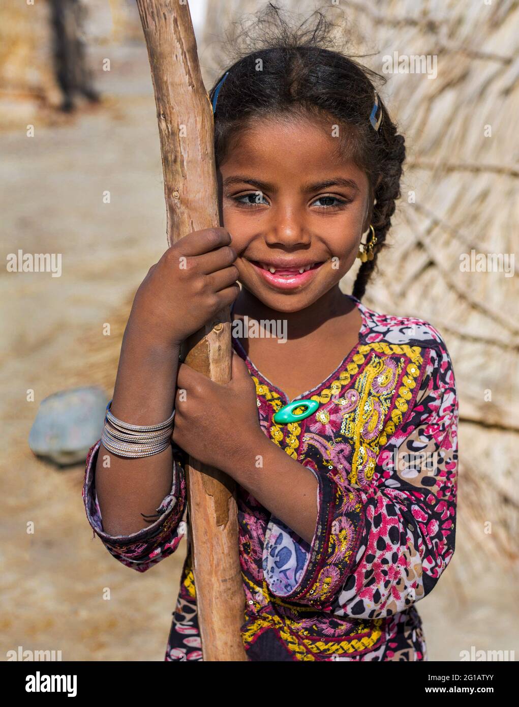 Portrait of Baloch Girl (Baluch) in Nikshahr county, Sistan and Baluchestan province of Iran. Stock Photo