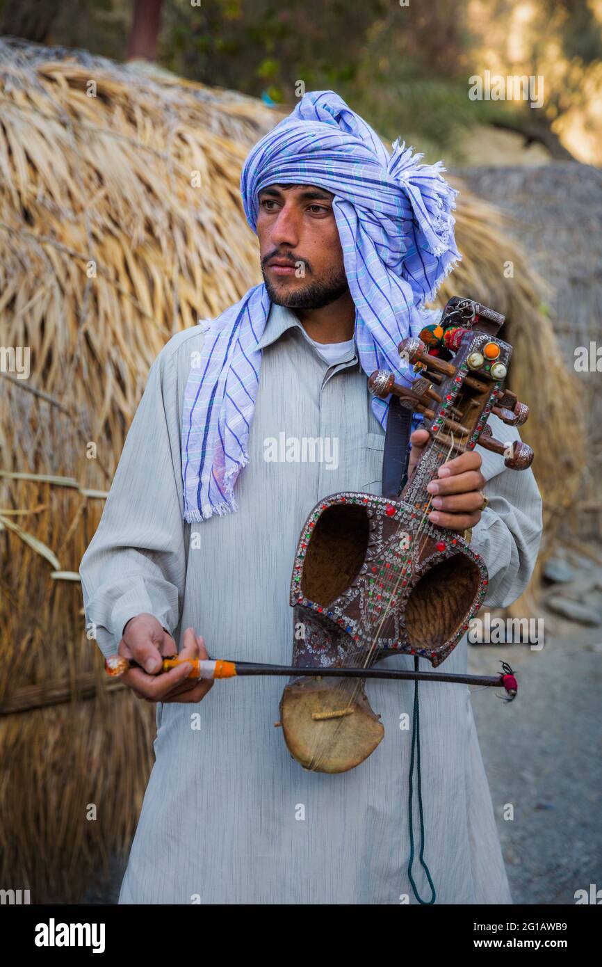 The Baloch tribe is one of the oldest Iranian tribes whose music is influenced by Indian melodies because of being close to India. Stock Photo