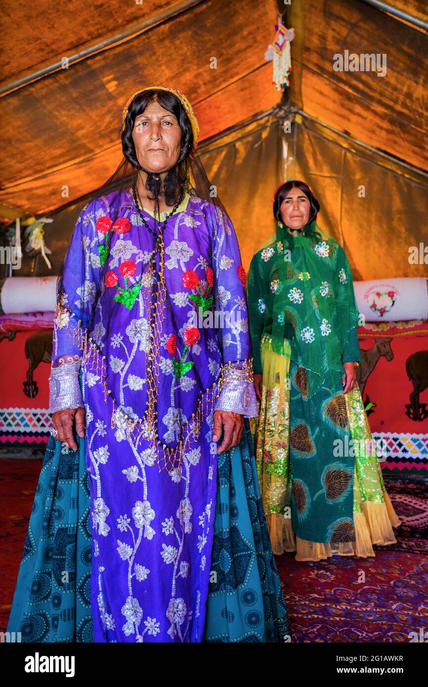 Qashqai women in their tent, Semirom, Esfahan Province, Iran. / Nomad people of Iran. Ghashghai are the most famous nomadic tribes of Iran. Stock Photo