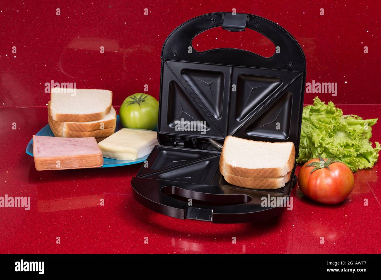 Sandwich maker; photo with ingredients to make sandwiches Stock Photo