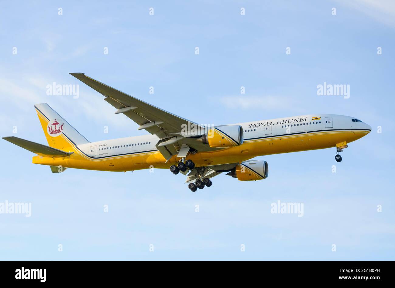 Royal Brunei Airlines Boeing 777 airliner jet plane V8-BLE landing at London Heathrow Airport, UK. National flag carrier airline of Brunei Darussalam Stock Photo