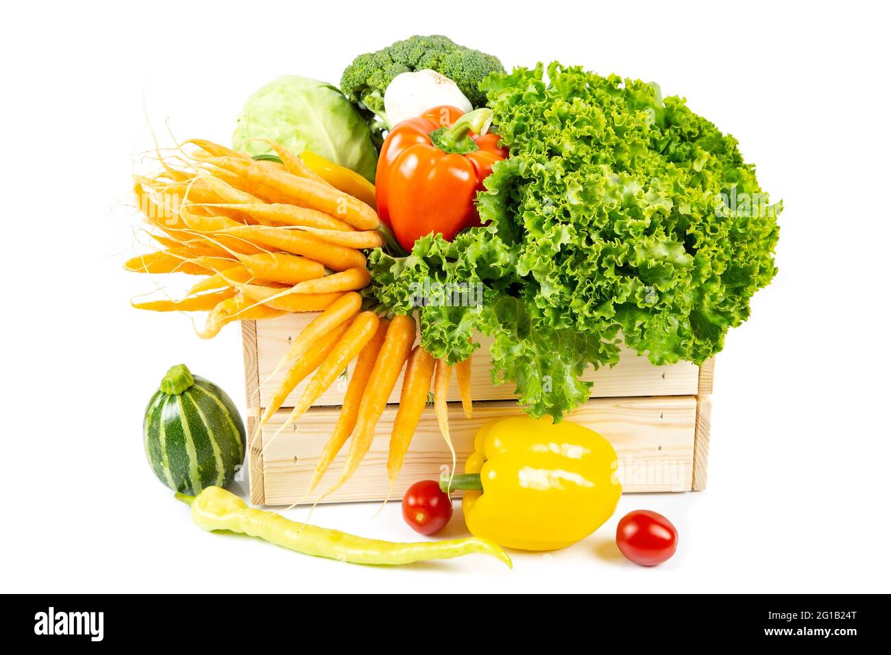 Fresh vegetables in wooden box Stock Photo