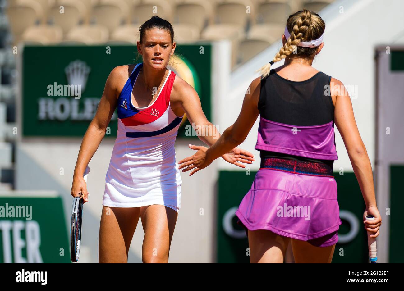 Paris, France. 06th June, 2021. Chloe Paquet and Clara Burel of France in  action during the third round of doubles at the Roland-Garros 2021, Grand  Slam tennis tournament on June 6, 2021