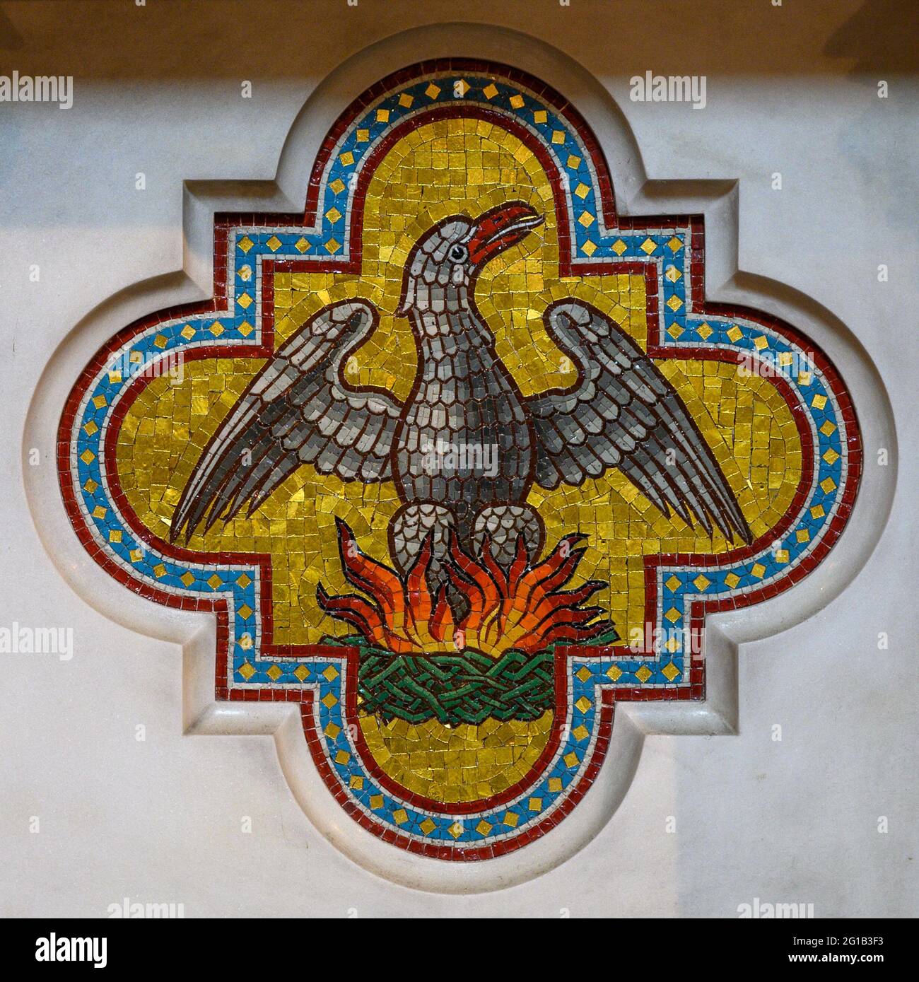 Mosaic of the Phoenix as a symbol of the Resurrection of Jesus Christ. Votivkirche – Votive Church, Vienna, Austria. Stock Photo