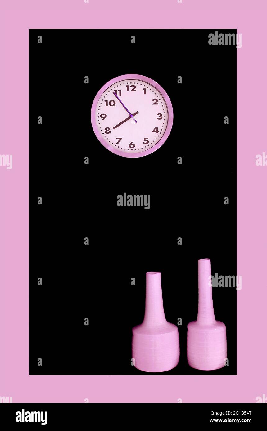 Pastel Pink Clock and Vases on Black Decorating Space Stock Photo