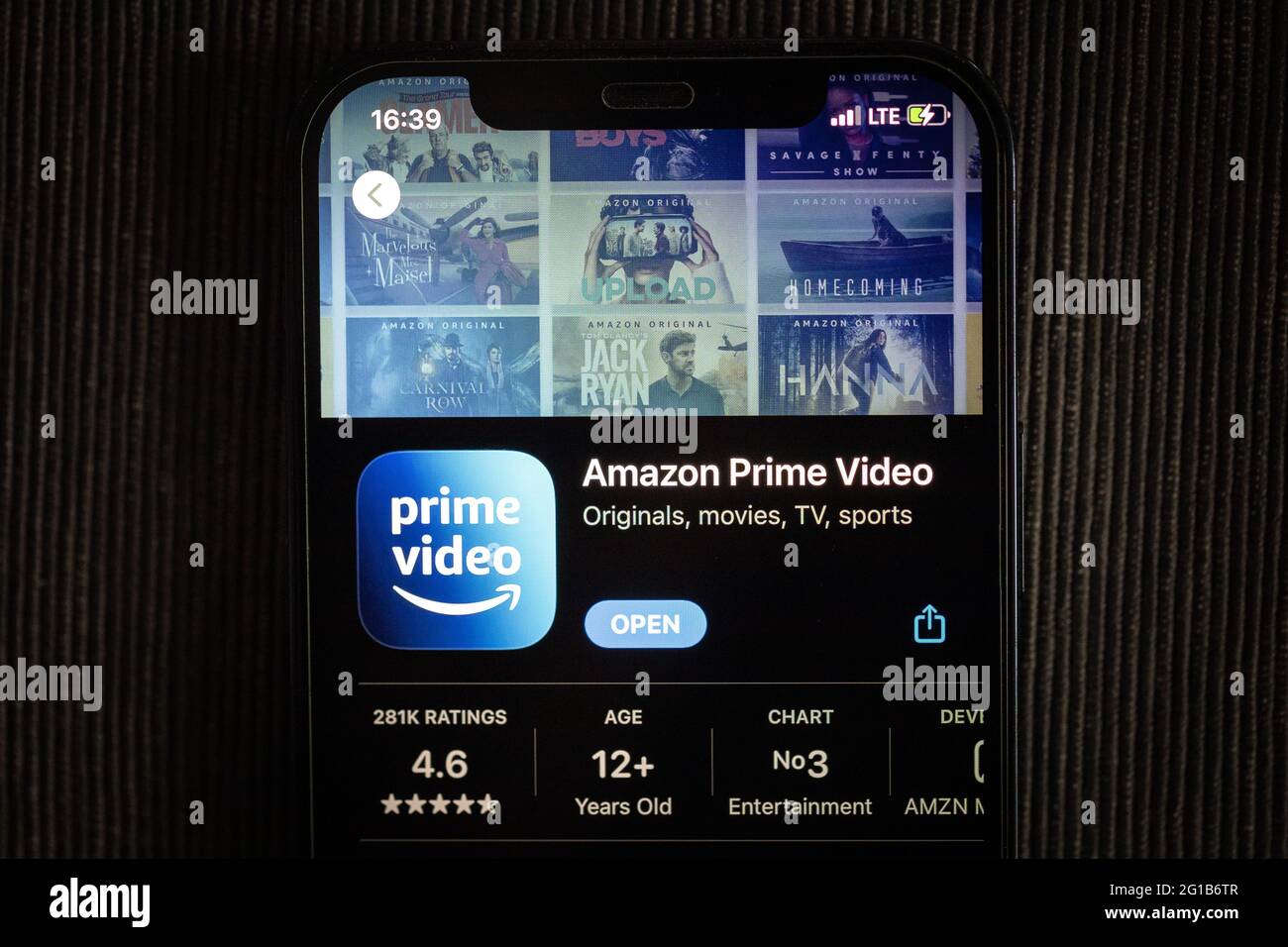 Amazon prime video app in the apple App Store seen on an iPhone 12 screen. Stock Photo