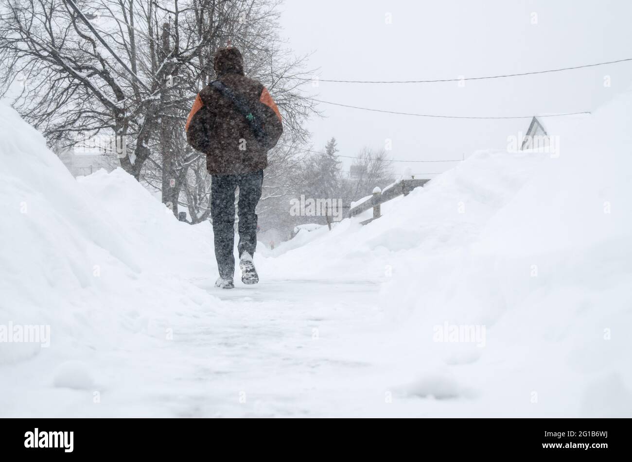 Pedestrians or people walking in the sidewalk during a harsh Winter in Toronto due to the superstorm or polar vortex of 2014. Stock Photo