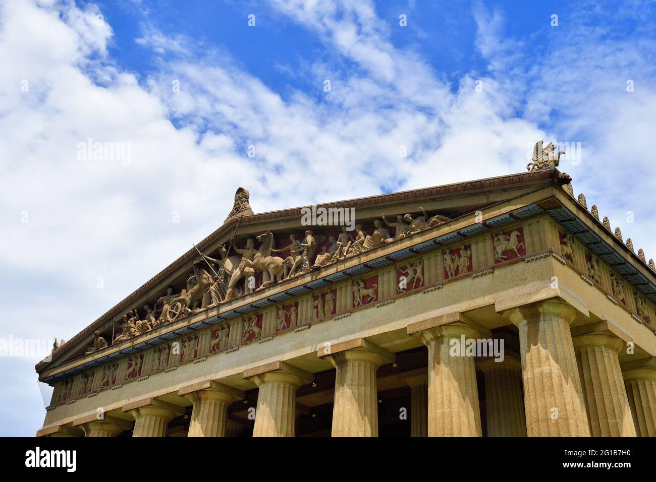 Nashville, Tennessee, USA. Columns meet roof sculpture detail at the Parthenon in Centennial Park. Stock Photo