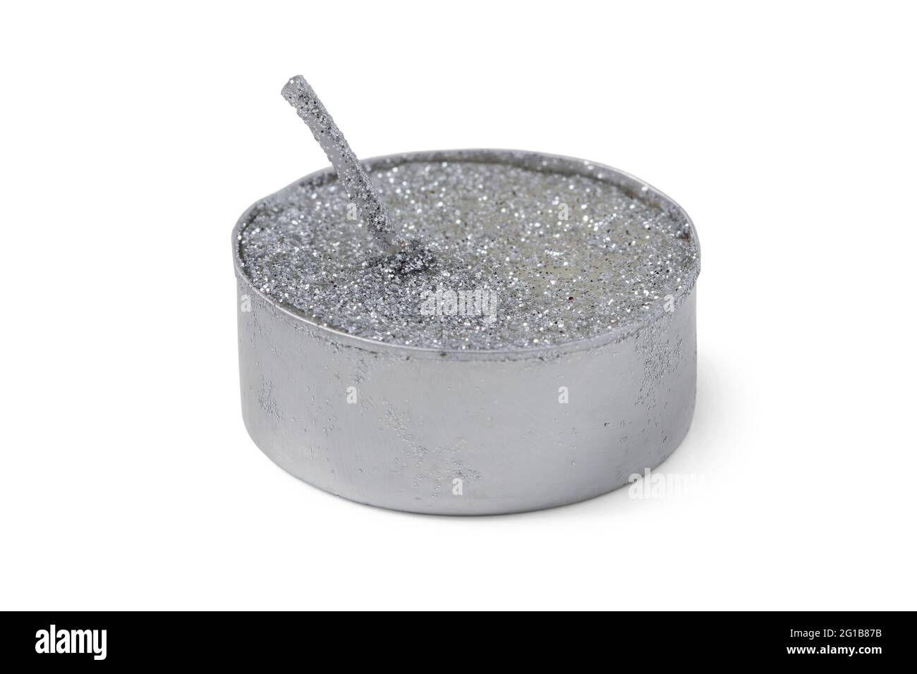 Festive tea candle with sparkles isolated on white background Stock Photo