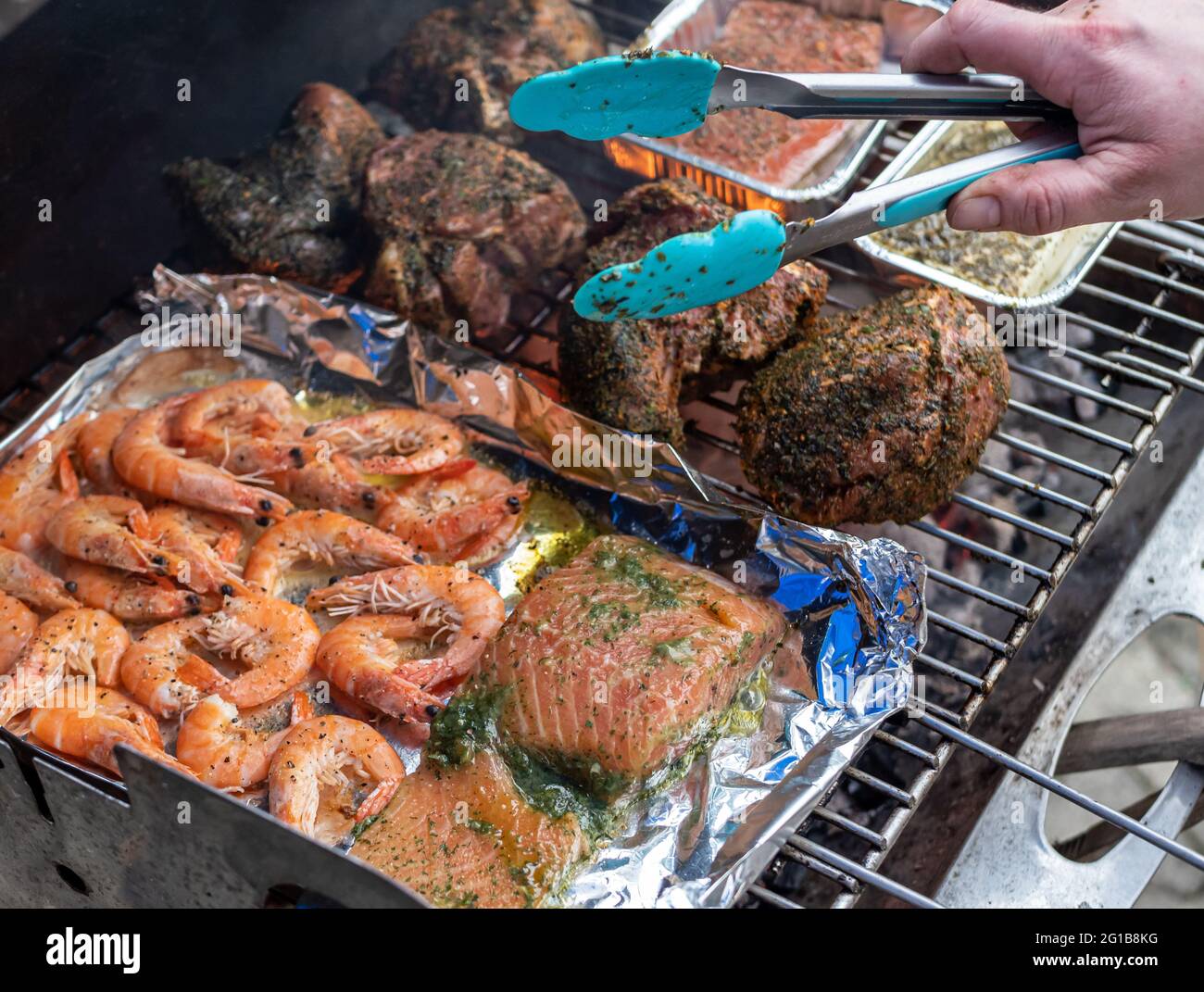 Meat roast and fish on the charcoal grill Stock Photo Alamy