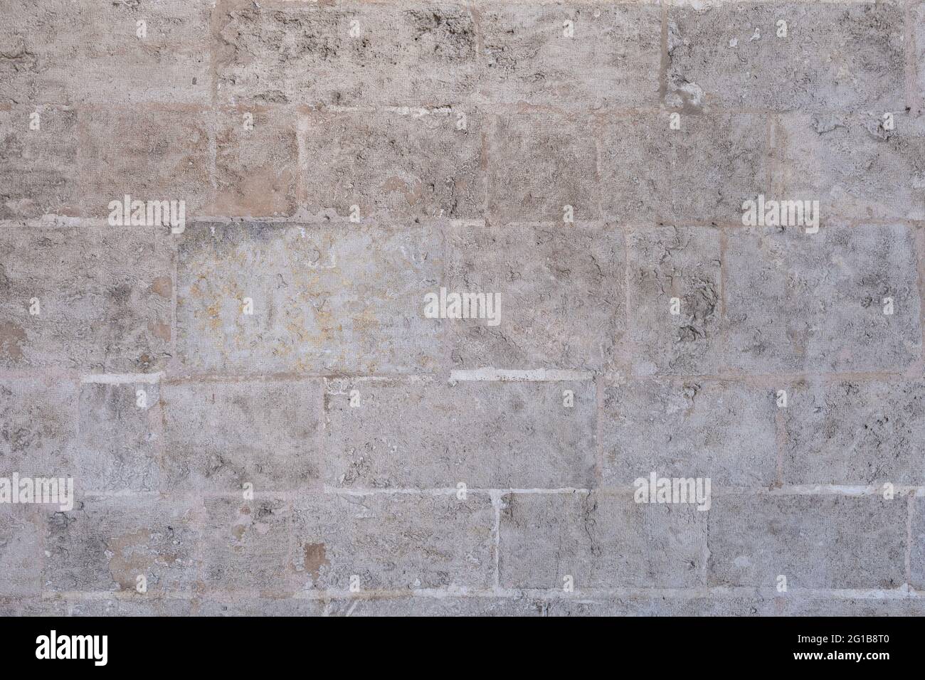 Texture of an old stone wall in brown tones. Architecture backgrounds Stock Photo