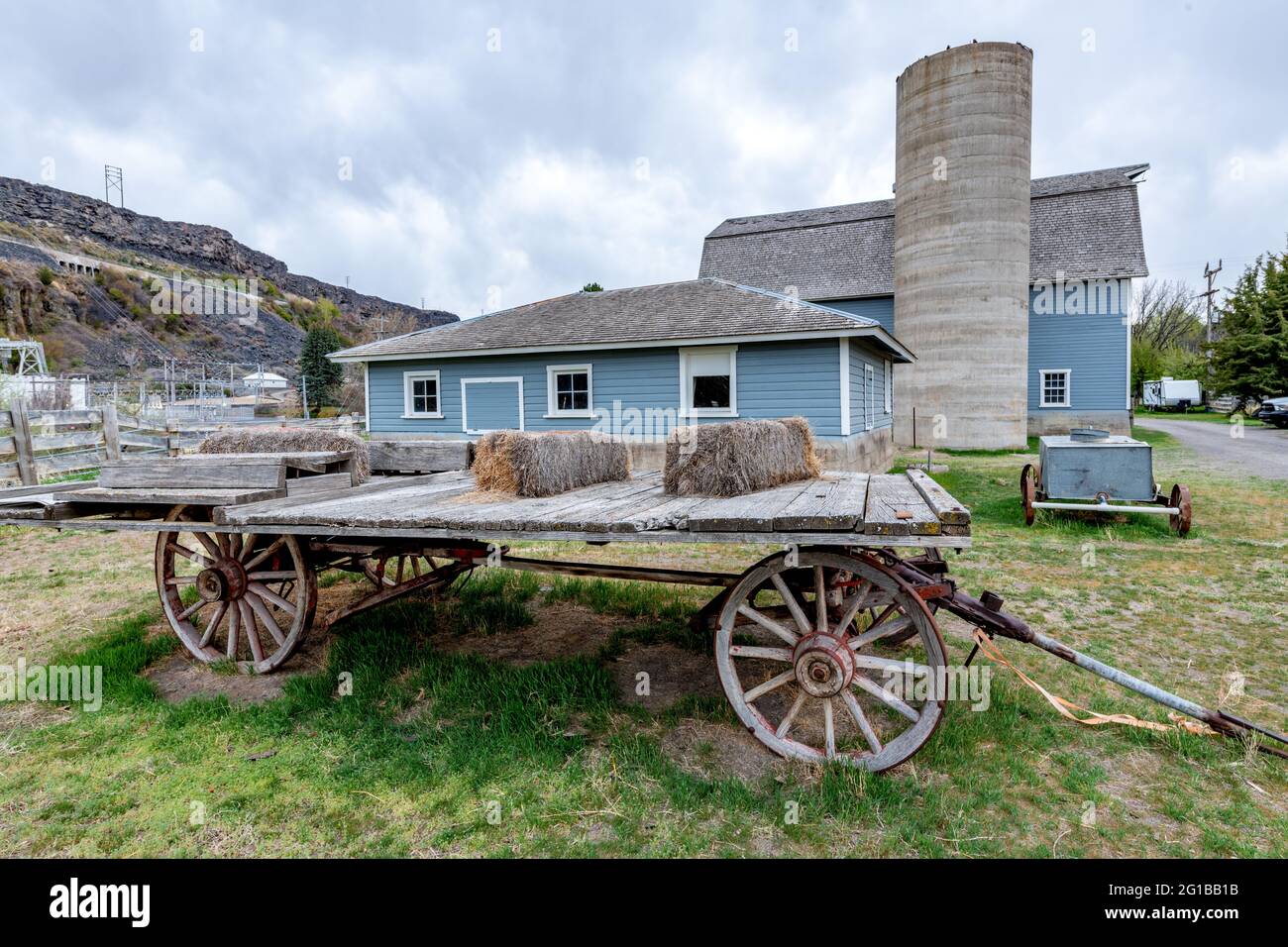 Rustic farm in Idaho with an old wooden wagon cart Stock Photo