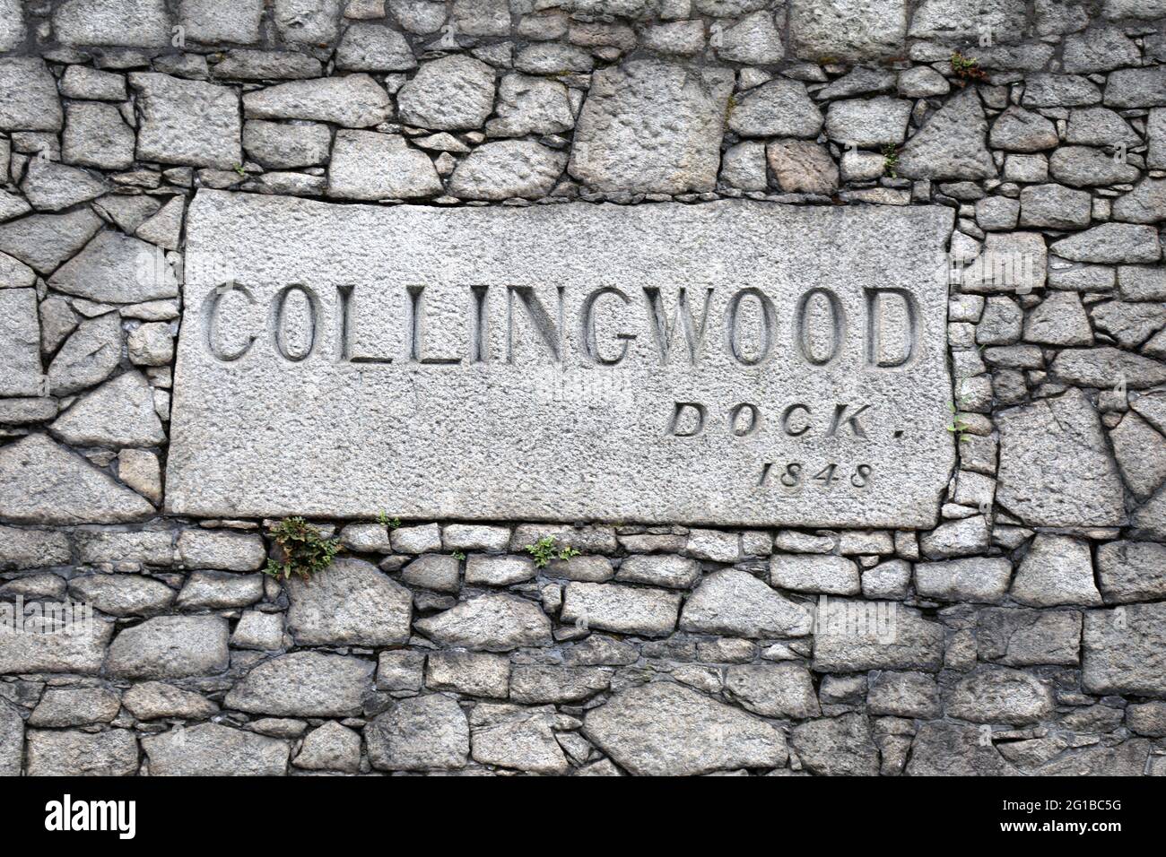 Collingwood Dock sign at Liverpool in the boundary wall of the dockyards Stock Photo