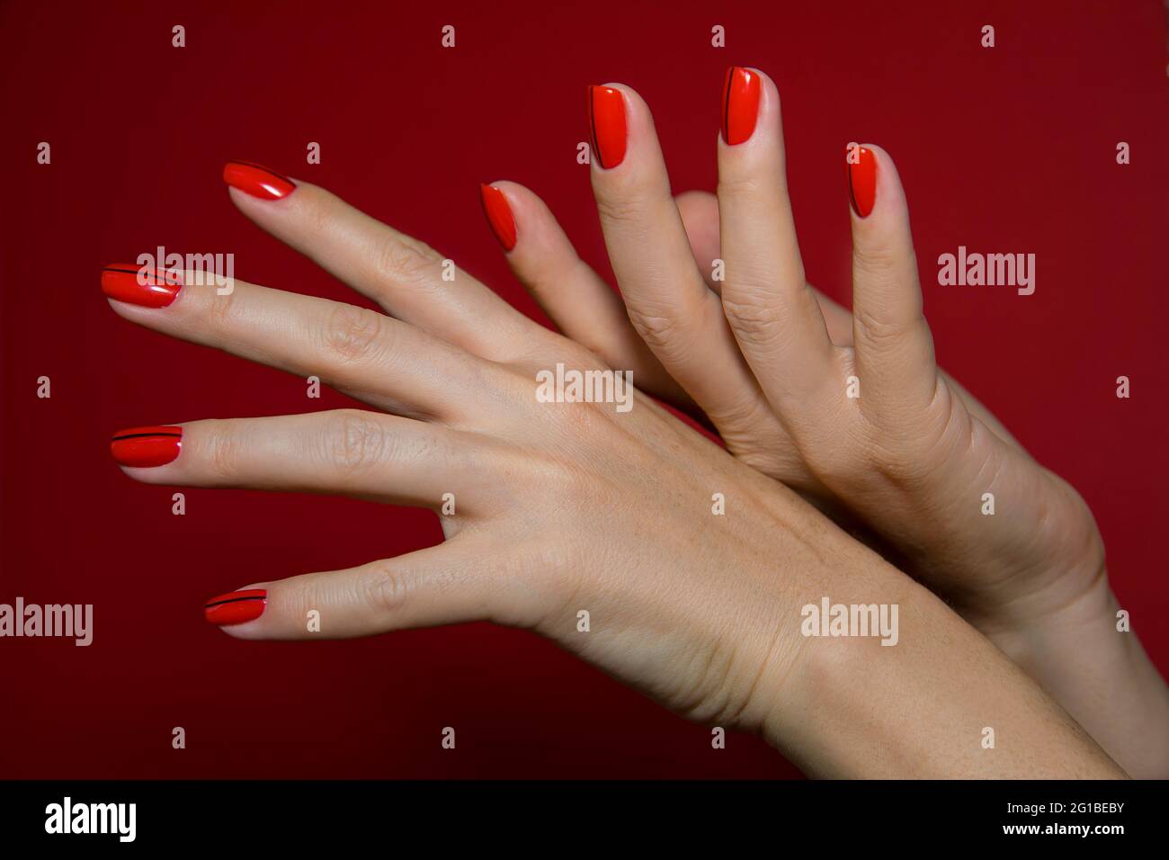 Nail design . Manicure nail paint . beautiful female hand with colorful nail art design manicure Stock Photo