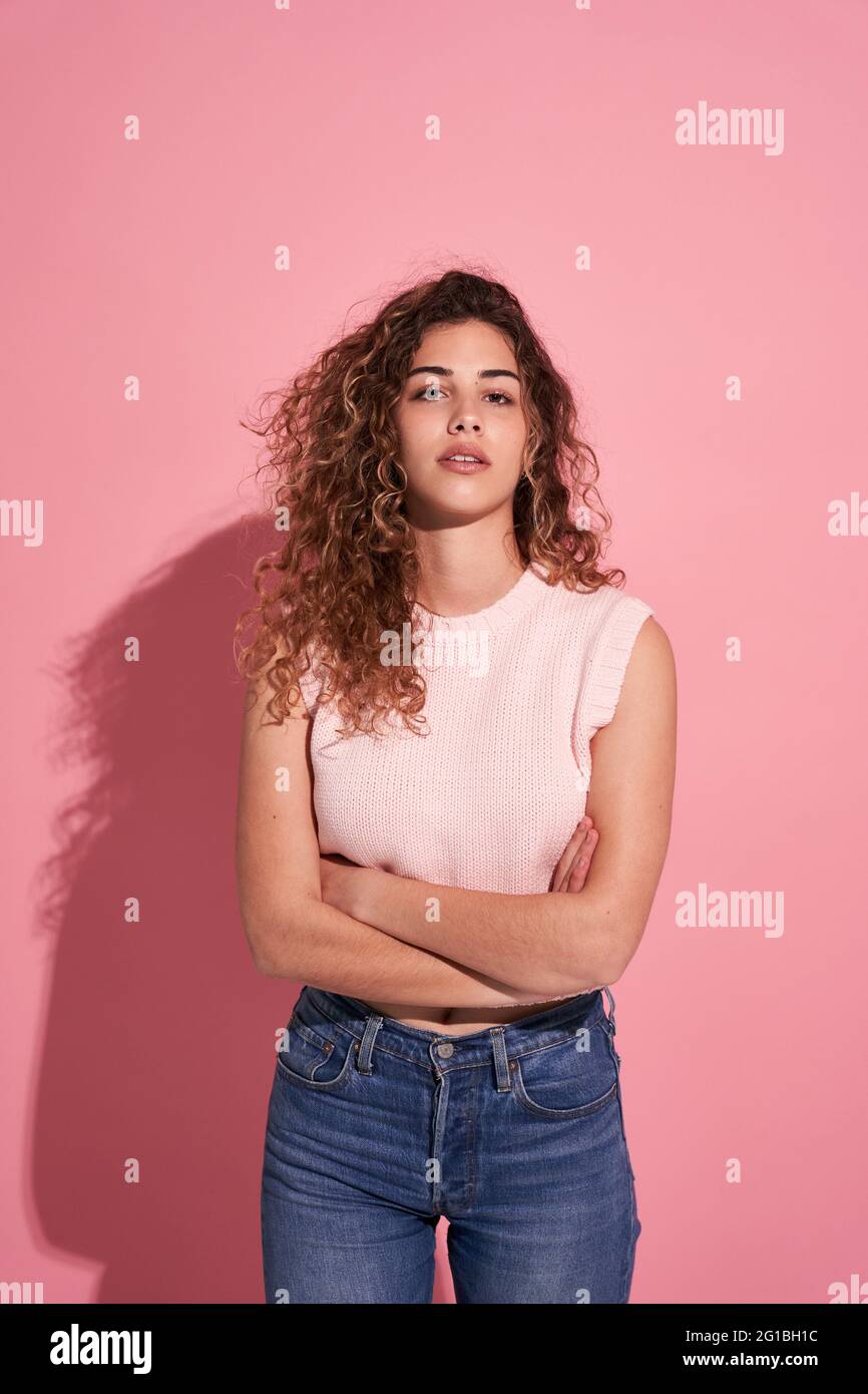 Woman wearing pink top jeans hi-res stock photography and images - Alamy