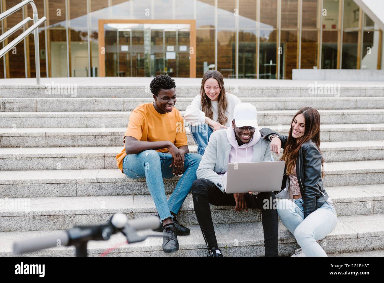 Diverse young women using hi-res stock photography and images - Alamy