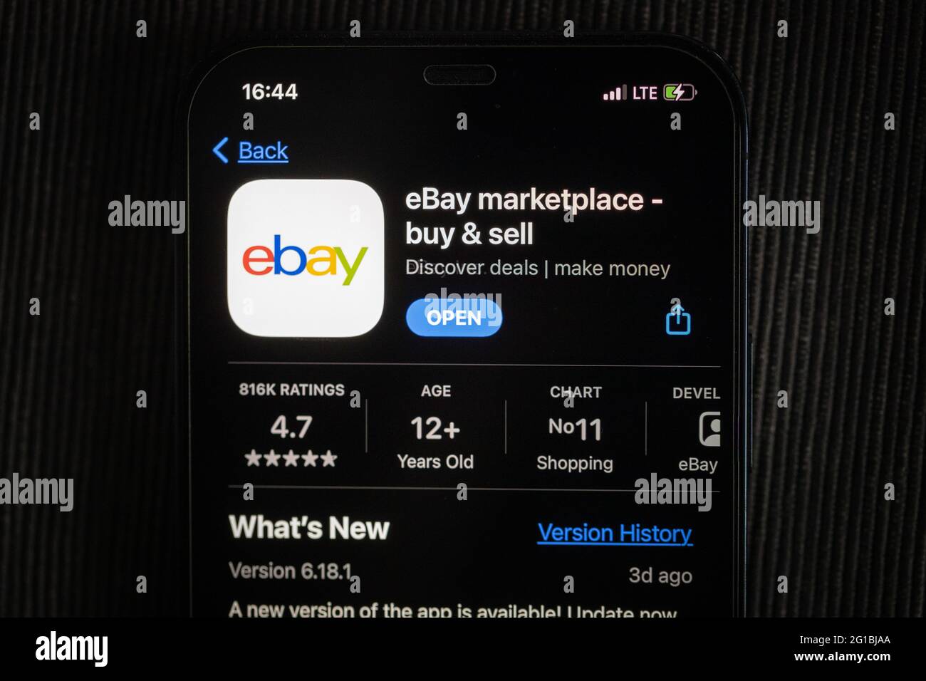 Ebay app in the apple App Store seen on an iPhone 12 screen. Stock Photo