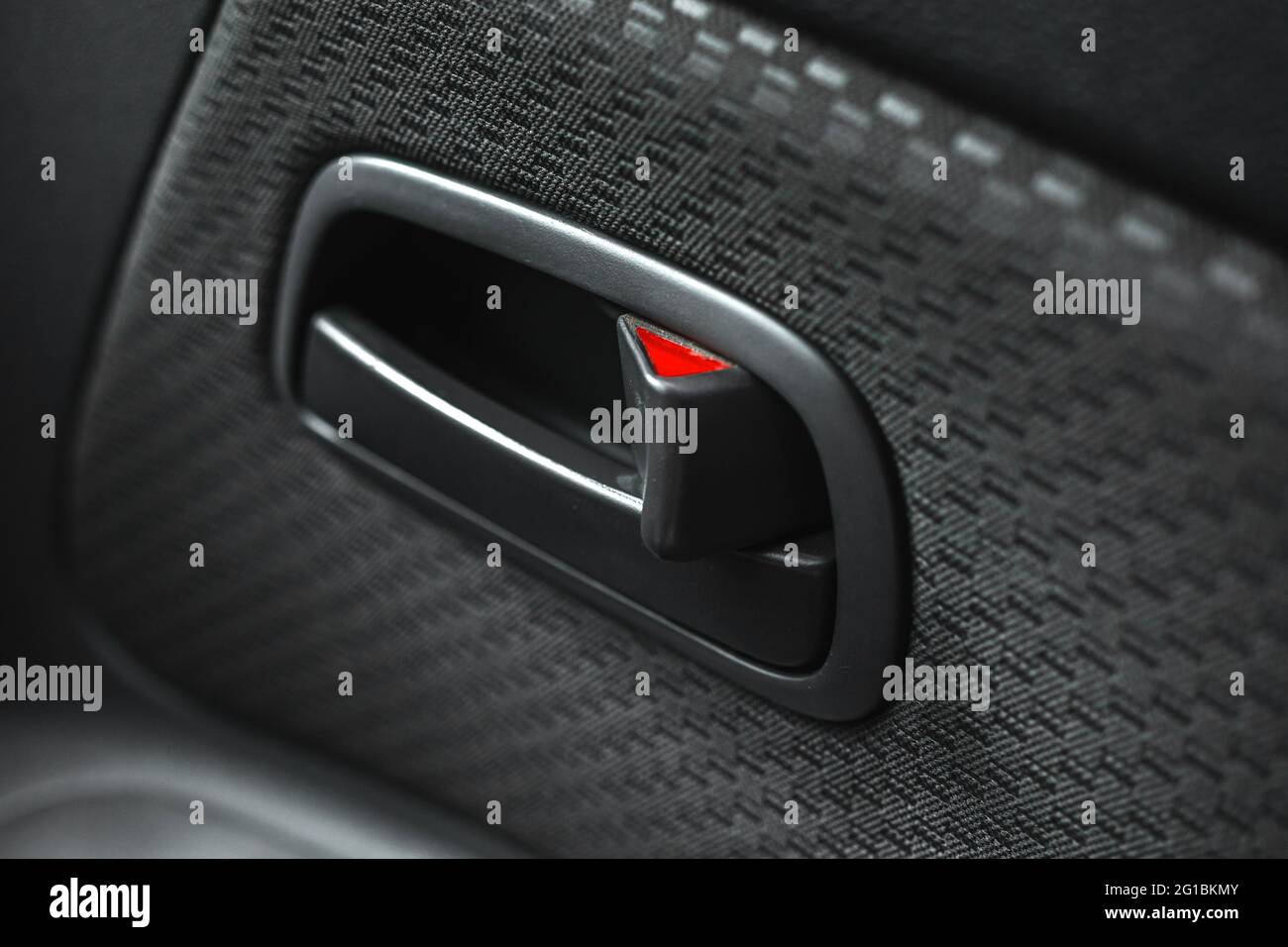 Car door handle inside, close up photo, interior of modern car with