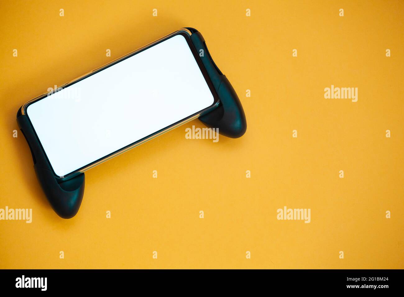 Joystick mobile phone, screen mockup Isolated on yellow background top