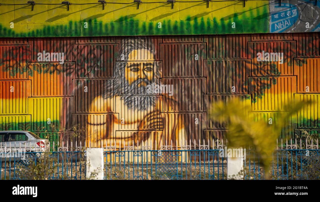 Painting of Indian Hindu religious saint at Holy city of Haridwar during largest festival of India Kumbh Mela 2021. High quality photo Stock Photo
