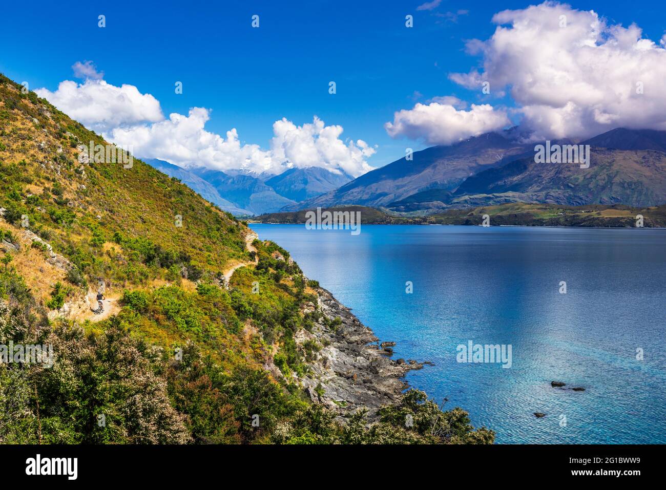 Cycling the shore of Lake Wanaka, Otago, South Island, New Zealand ...