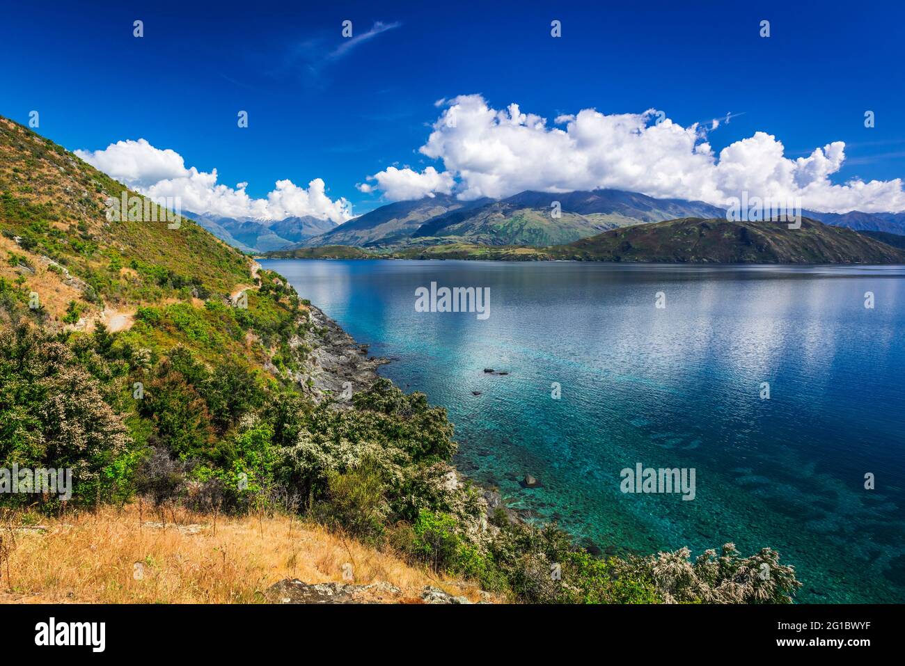 Cycling the shore of Lake Wanaka, Otago, South Island, New Zealand ...