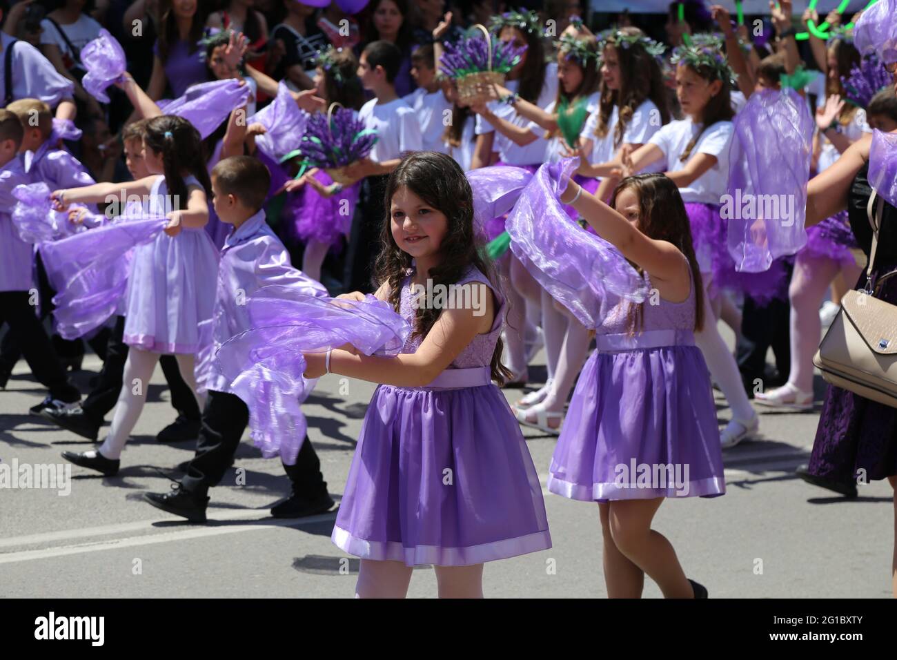 Kazanlak, Bulgaria. 6th June, 2021. Children participate in the Rose Festival parade in Kazanlak, Bulgaria, on June 6, 2021. The culmination of the 2021 Rose Festival was witnessed in Kazanlak this weekend. Kazanlak was known for its Rose Festival, which has been organized annually since 1903. The festival celebrates local residents' deep connection to the Rosa Damascena -- the Bulgarian oil-bearing rose -- for centuries. Credit: Lin Hao/Xinhua/Alamy Live News Stock Photo