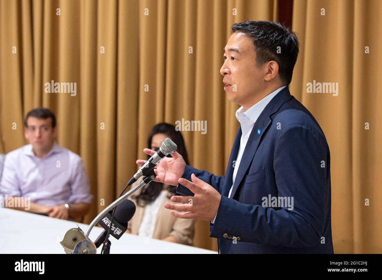 NEW YORK, NY – JUNE 06: Mayoral candidate Andrew Yang speaks at a John F. Kennedy Regular Democratic Club rally in Kew Gardens Hills, Queens on June 6, 2021 in New York City.   New York City Mayoral candidate Andrew Yang joins Assembly Member Dan Rosenthal and members of the John F. Kennedy Regular Democratic Club for a Queens "Day of Action" rally in support of the Yang for NY campaign. Stock Photo