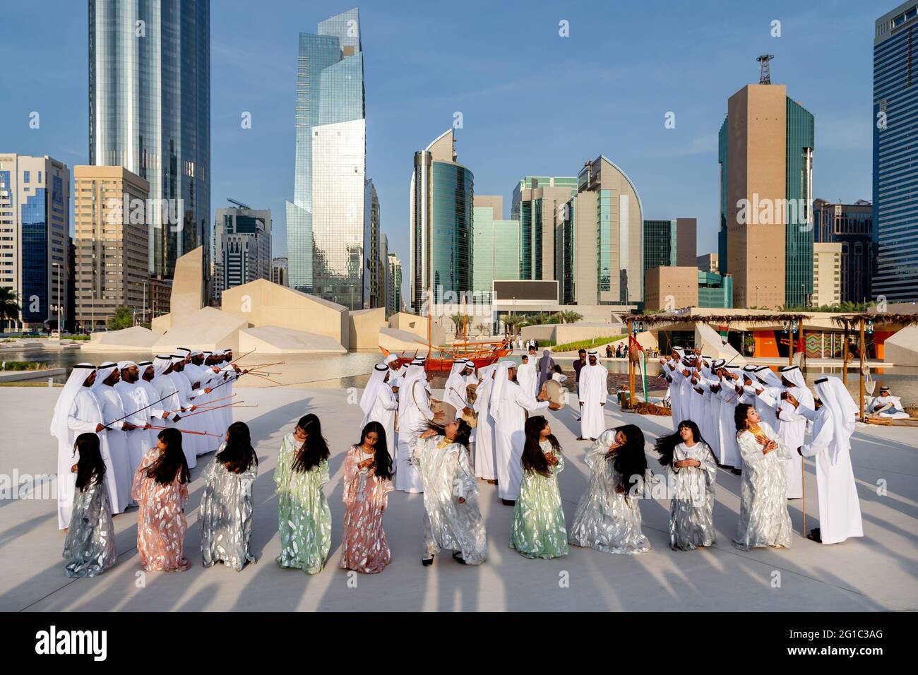 ABU DHABI, UAE - DECEMBER 14, 2019: Traditional Emirati male Al Ayalah dance at Al Hosn Festival Stock Photo