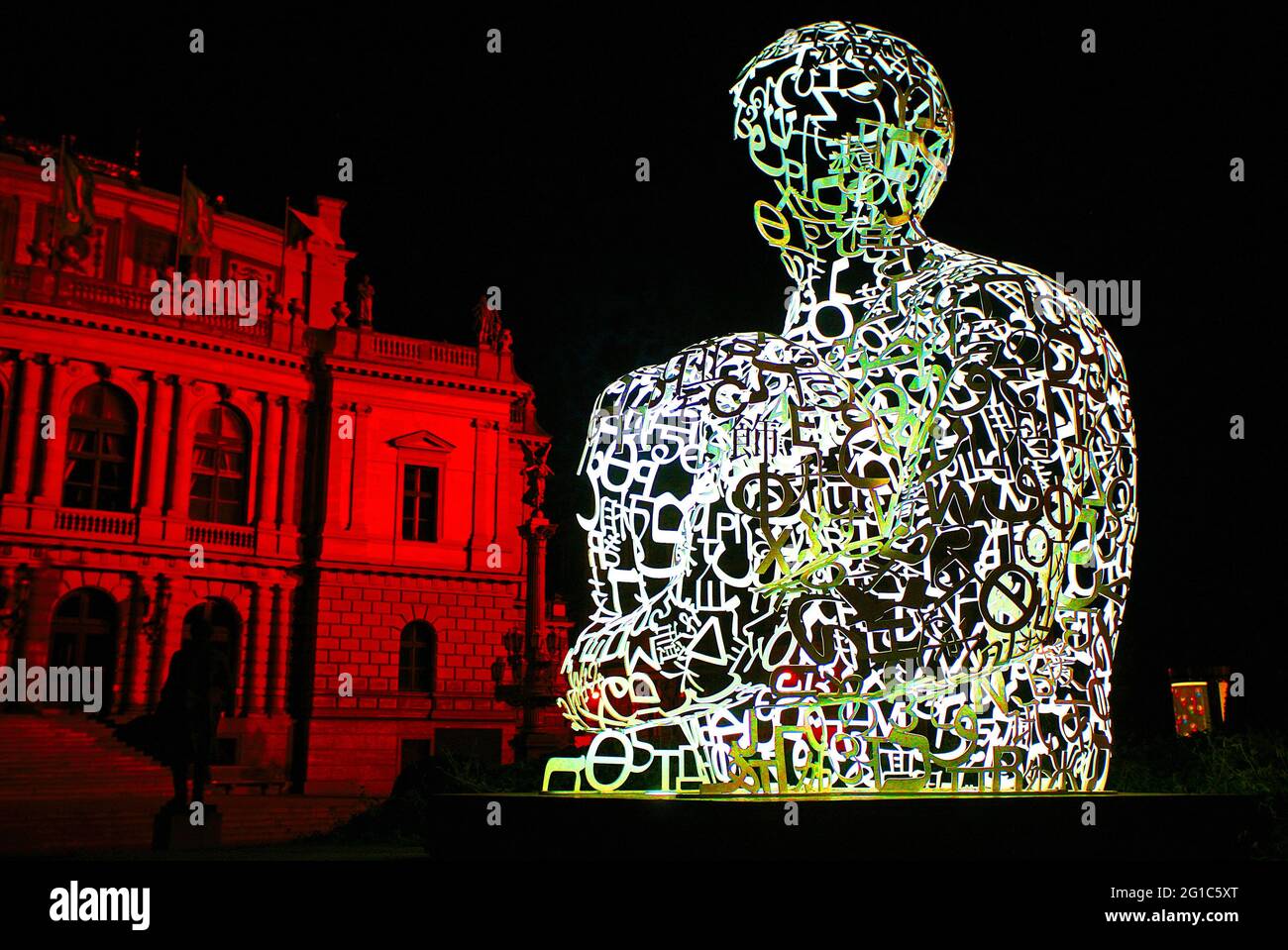Prague, Czech Republic - June 04, 2009: night illumination of the Sitting Man figure in the center of Prague Stock Photo