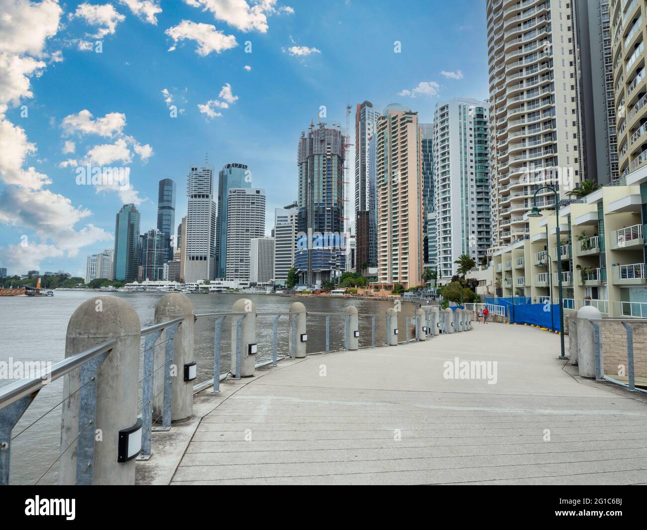 Riverwalk in the city of Brisbane, Apartment buildings, offices, hotels, pedestrian path. Brisbane, Queensland, Australia. Stock Photo