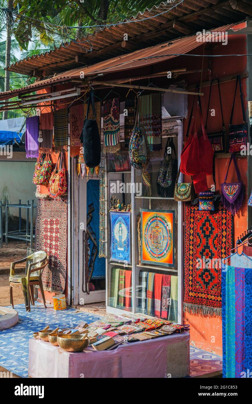 Shop on Main Street selling embroideries, textiles, fabrics, bags and handicrafts, Agonda, Goa, India Stock Photo