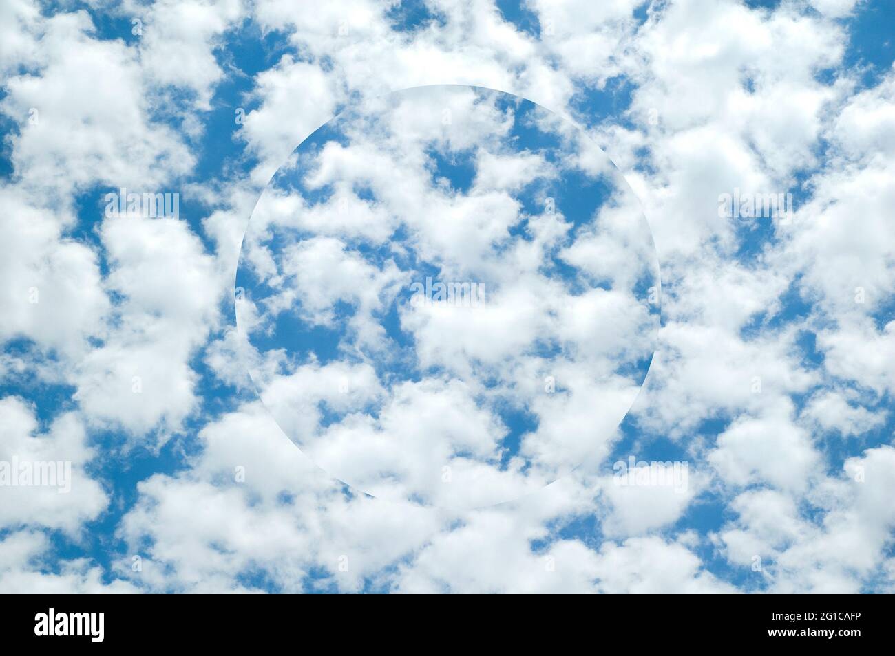 Abstract clouds sky background with illusionary sphere Stock Photo