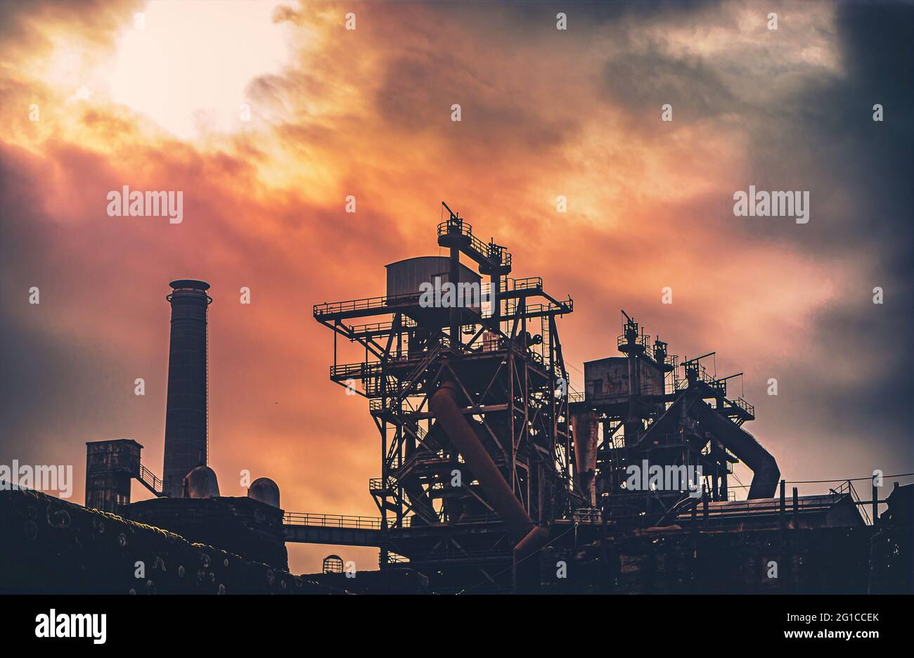 Ironworks in the Ruhr area in dramatic weather. Steelworks, colliery ...