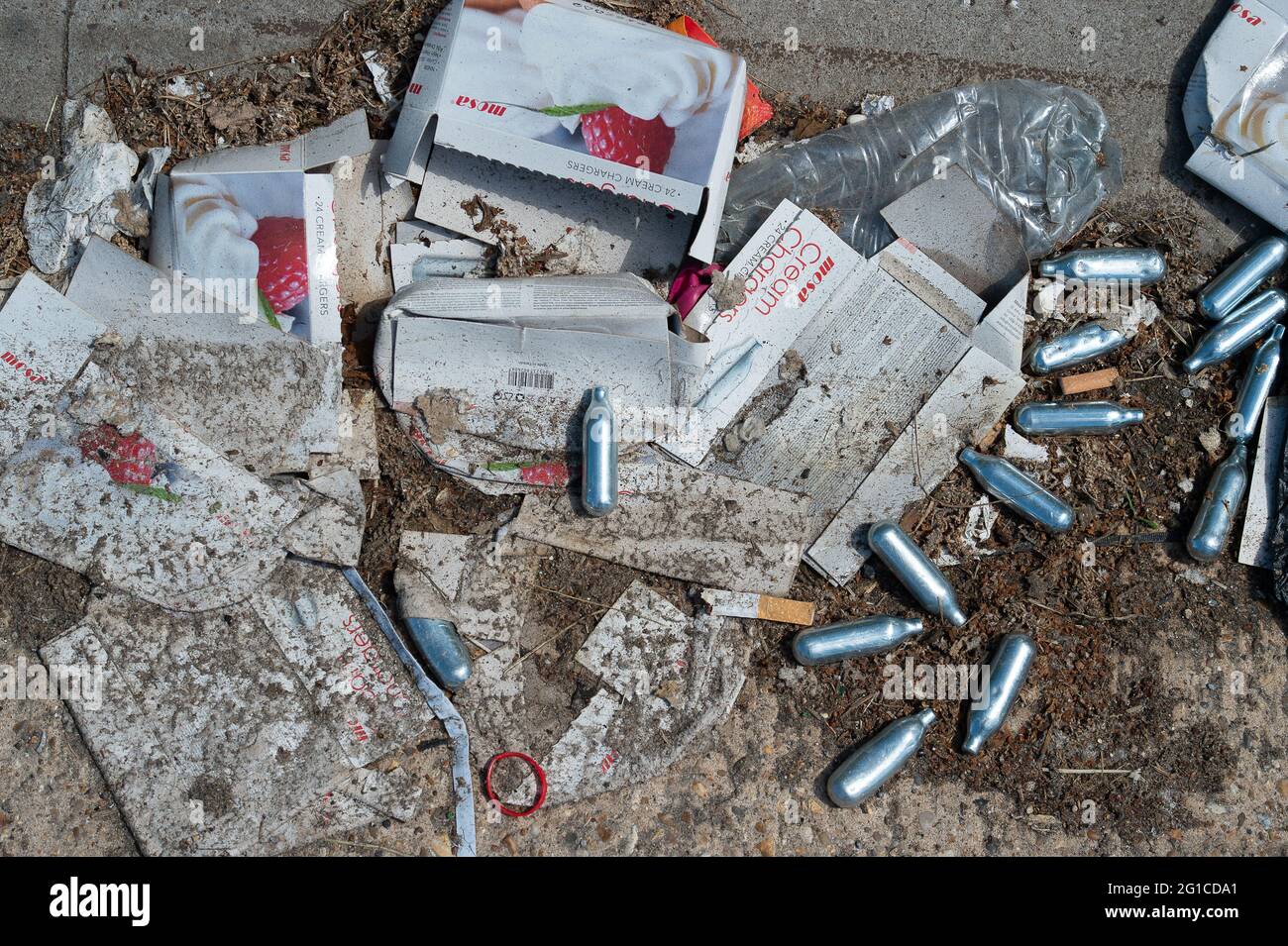 Empty Nitrous Oxide Cannisters High Resolution Stock Photography and