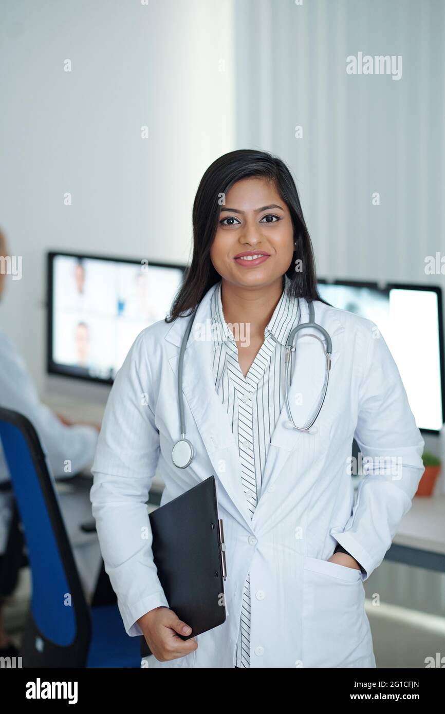 Female physician standing hi-res stock photography and images - Alamy
