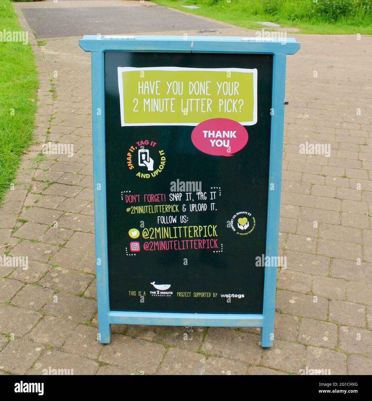 Litter picking sign board encouraging people to help keep Britain tidy