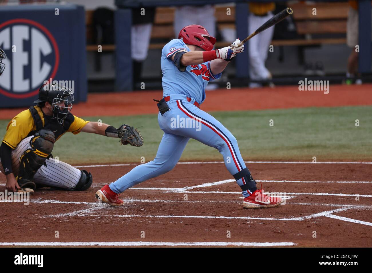 June 06, 2021 Ole Miss catcher Hayden Dunhurst (13) gets a hit during